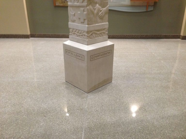 Stain removal on statue commercial before